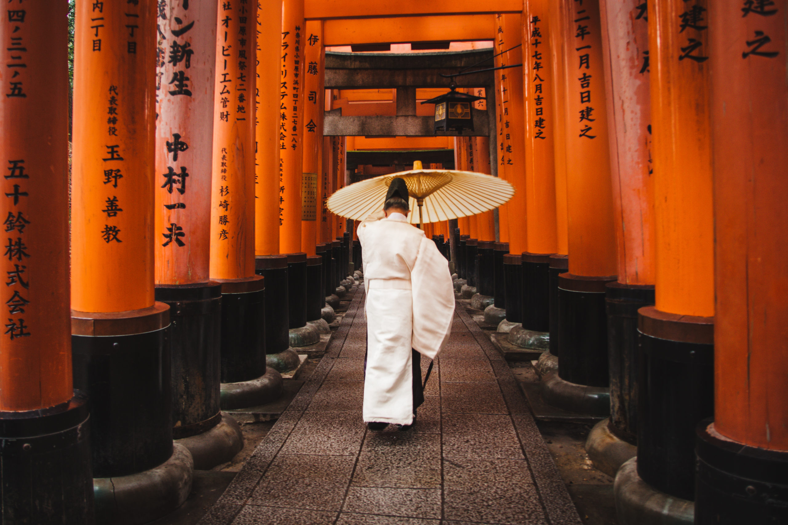 Person holding umbrella in Osaka Japan